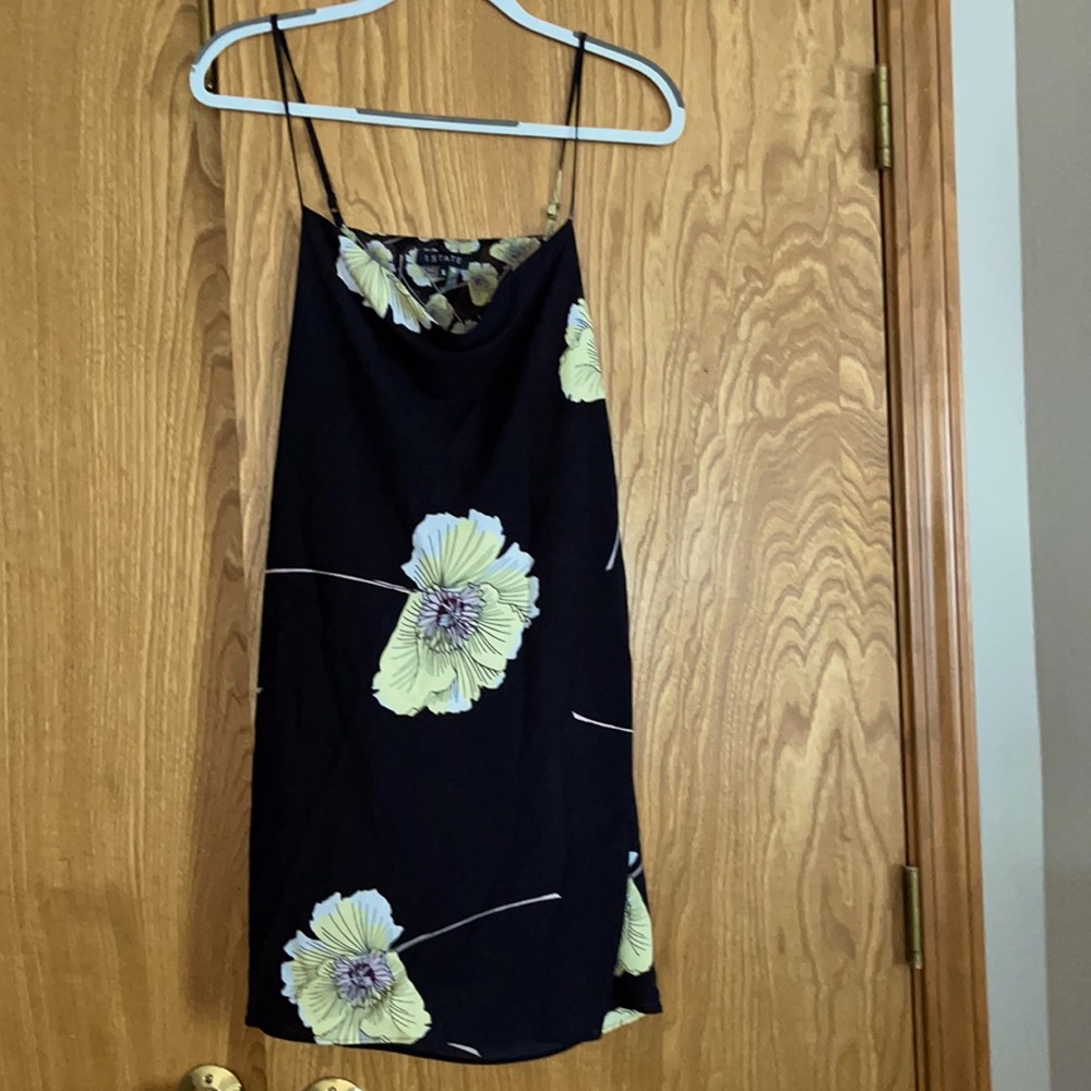 I state floral dress. Size small.